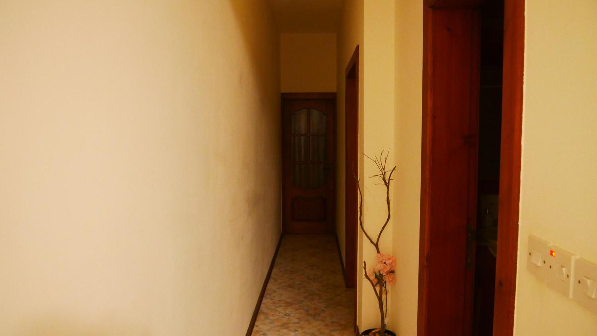 Проживание в семье Marsalforn's Cosy *
